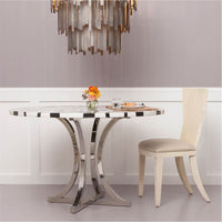 Made Goods Leighton Round Metal Dining Table in Geometric Marble