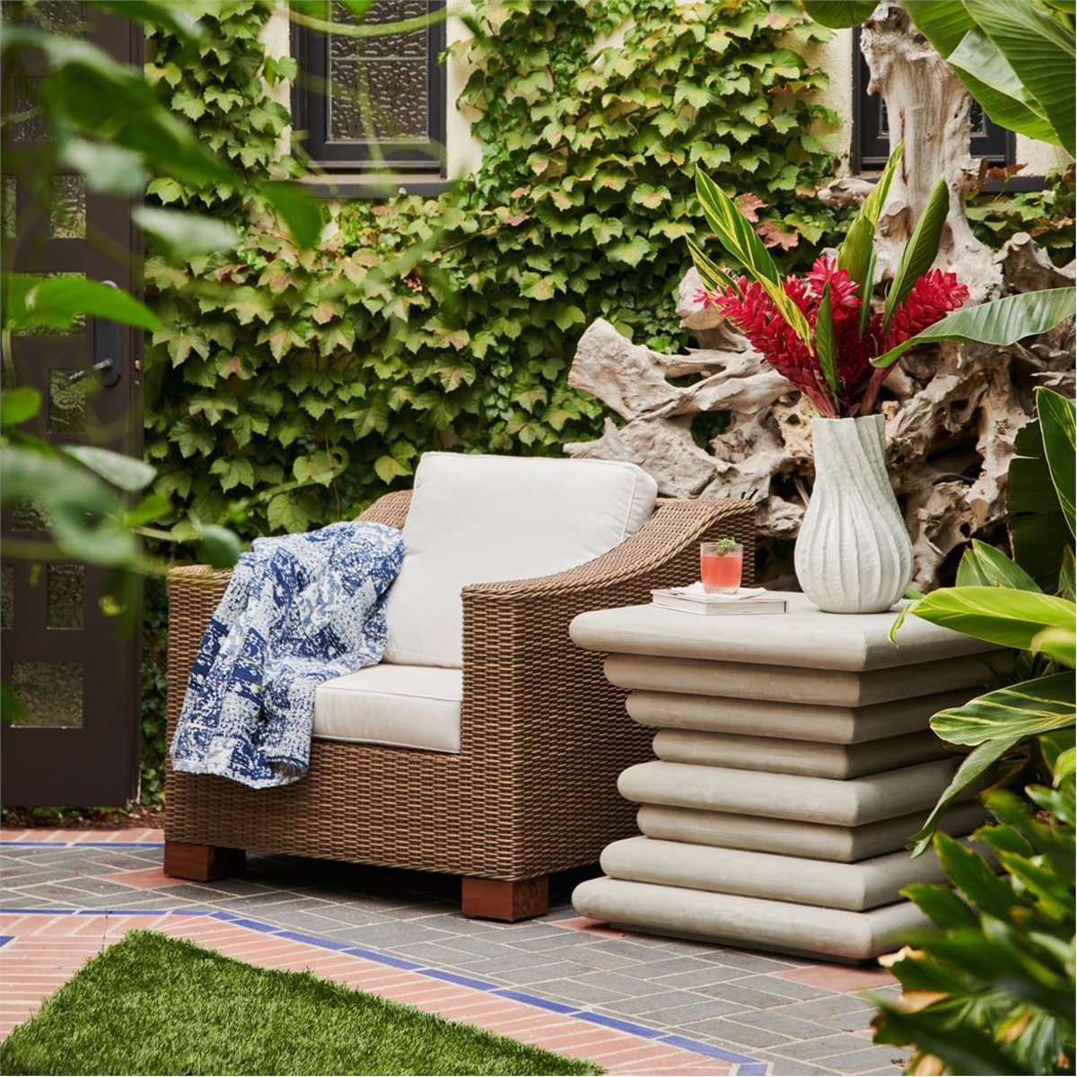 Made Goods Marina Faux Wicker Outdoor Lounge Chair in Volta Fabric